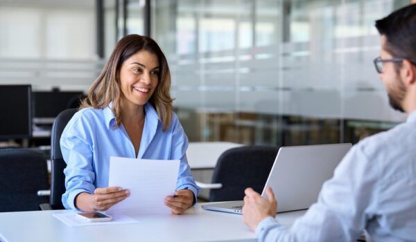 Executive interviewing a candidate as part of a talent acquisition strategy